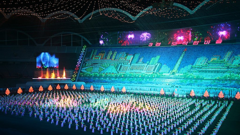 Illustration for article titled The Amazing, Colorful Flip Card Propaganda Mosaics of North Korea
